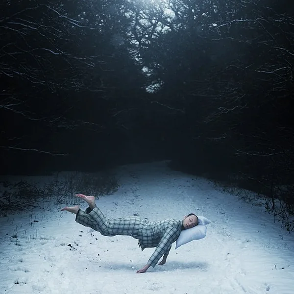 Simon McCheung conceptual fine art surreal fashion portraiture printed on Fuji Crystal Matt C-Type featuring man sleeping in mid air