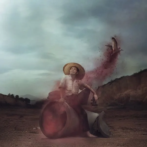 Simon McCheung conceptual fine art surreal fashion portraiture printed on Fuji Crystal Matt C-Type featuring farmer releasing a bird Simon McCheung conceptual fine art surreal fashion portraiture printed on Fuji Crystal Matt C-Type featuring farmer releasing a bird