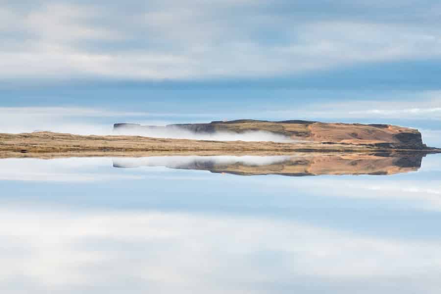 Thomas Heaton photographic series from Iceland won Editor's Choice British Outdoors Photography Competition landscape of water and small land