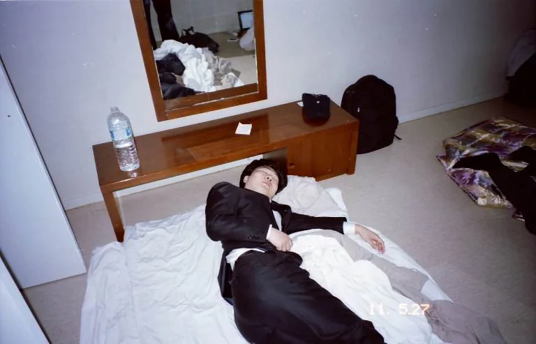 Jaejin Hwang photographic series printed on photographic printing paper C-Type Fuji Matt boy lying on bed